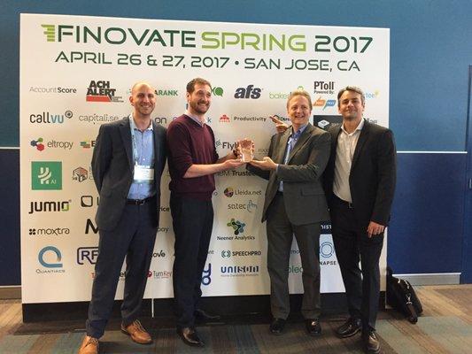 Members of the Unison team at Finovate Spring after they picked up a Best in Show award.