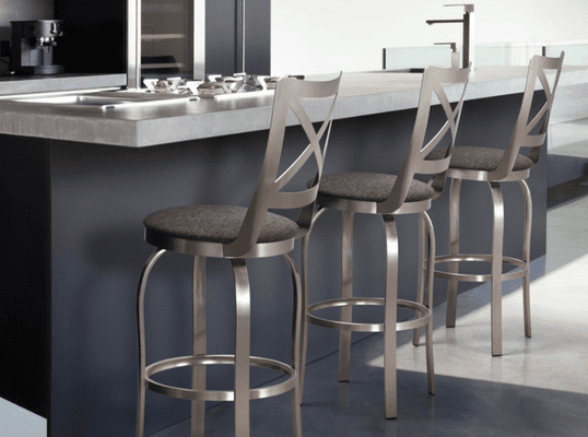 Contemporary Canadian metal swivel stools. Bar or counter height available.