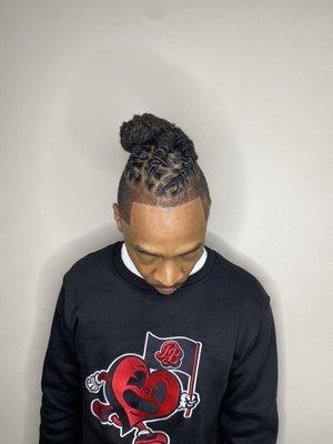 Retwist & style in a high bun with edge up