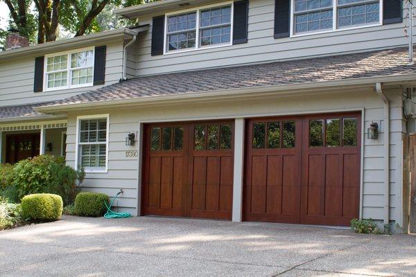 One of our custom built Prestige wood doors, with beveled glass.