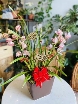 Pink cymbidium orchid arrangement