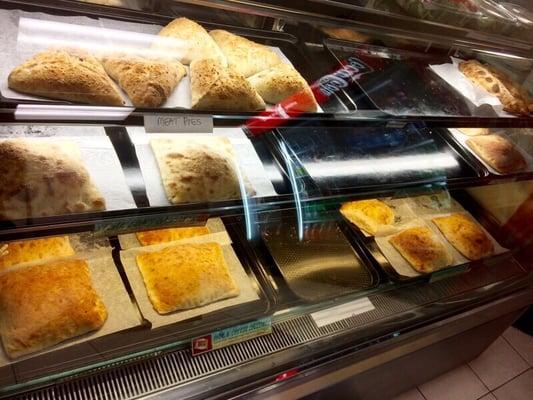 Case of savory baked goods like meat pies and calzones