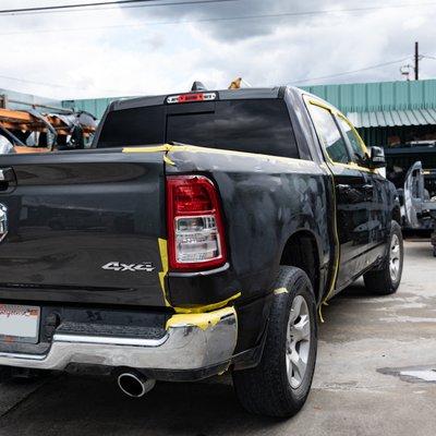 Dodge RAM 1500 in the shop with side swipe damage getting ready to hit the paint booth!