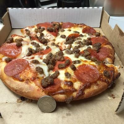 A small pepperoni and sausage pizza