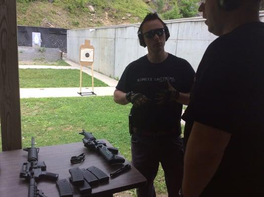 Talking about the ferfrans rate reducer before instructing an LEO on shooting a Stag 16 carbine in full auto.