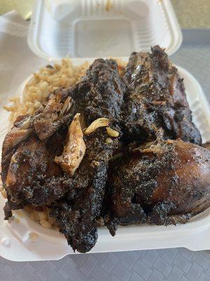 Small jerk chicken with peas and rice $9