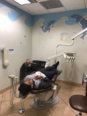 He always enjoys a movie while getting his teeth clean!!!!