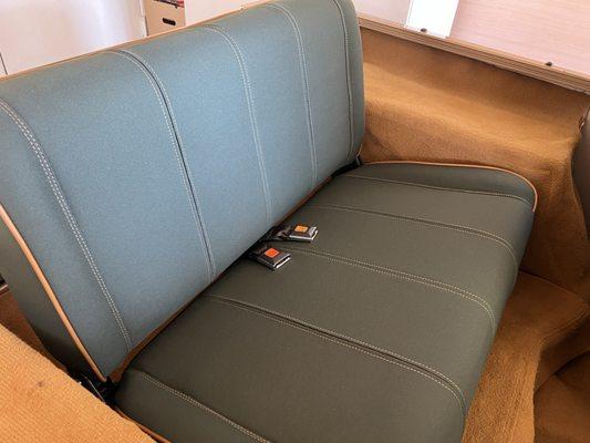 Rear bench reupholstered looking exactly like it did stock, including the carpeted bottom.