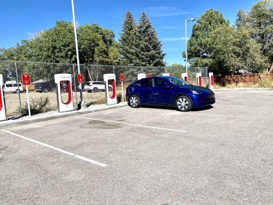 The Tesla SuperChargers are not at the Gas Station & General Store, which about 150 yards away, see photos