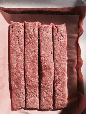 Ground chuck and sirloin blend. Fresh meat delivery every other day. Hand molded into quarter pound Burgerdogs.