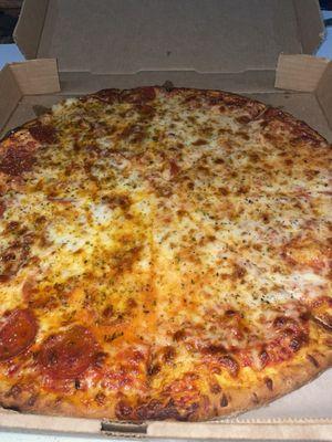 Fresh pepperoni and extra cheese pizza