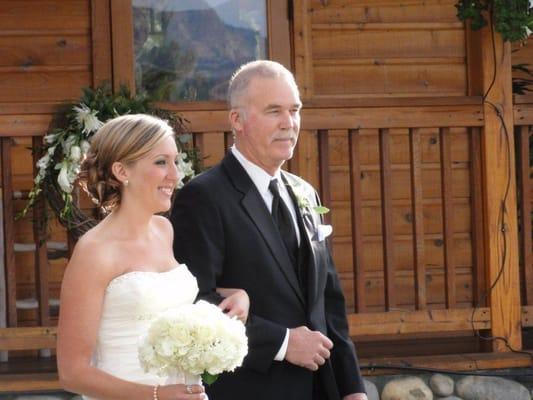 Crystal did my hair and makeup for my wedding.  I loved it!  (Dad walking me down the aisle.)