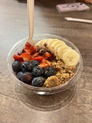 Ocean Breeze Açaí Bowl.   Blueberries, strawberries, banana, honey, granola and Açaí.