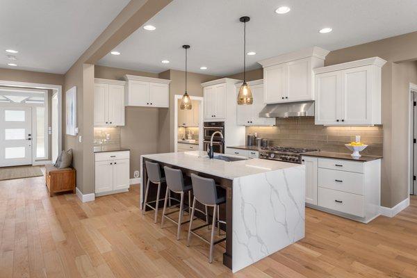 Custom Marble Kitchen with White cabinet choosing by Samuel and his sun Rick.
 Sunset Home Builders INC.