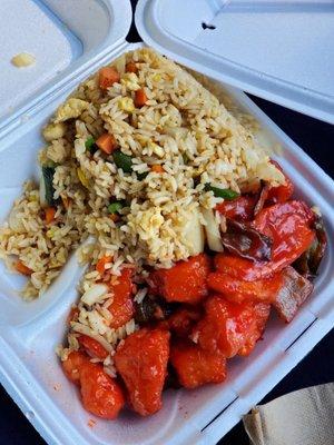 Sweet and sour chicken with fried rice.