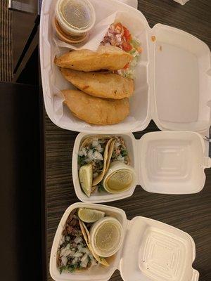 Chicken empanadas on the left, chicken tacos in the middle, and carne asada tacos on the far right.