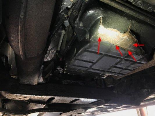 Moss Motors sent detailed pictures and descriptions of the problems with my truck. Cracks in my transmission fluid pan.