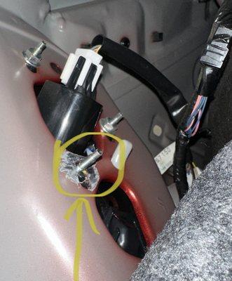 Missing taillight nut following subwoofer wiring removal