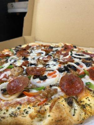 Our most popular item- The Supreme Pizza! Topped with fresh veggies, sausage, pepperoni, and fresh mozzarella.