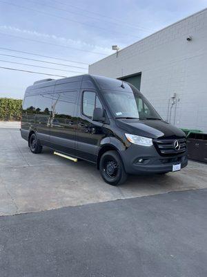 UCS Limo's new Sprinter 170' wheelbase 15 passenger van front corner right angle