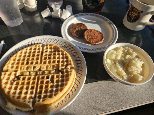 Pecan waffle, sausage patties and grits