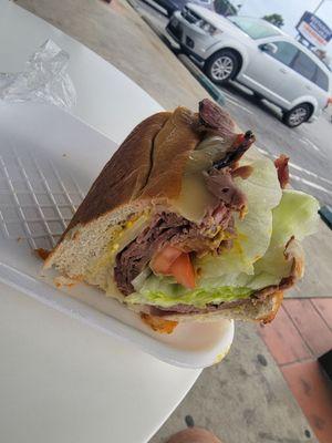 Thick, tasty roast beef sandwich on a soft roll