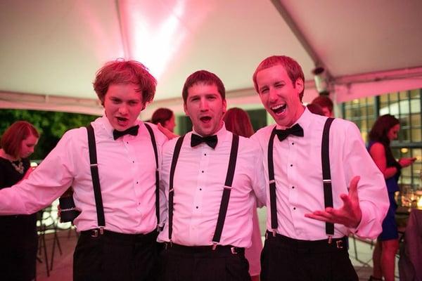 An elated groom and his sharply dressed groomsmen.  Courtesy of @dustywarren