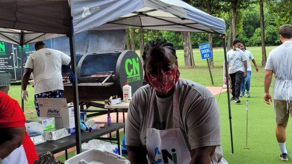 Grilling up Lunch for the kids participating in the Braid -A-Thon