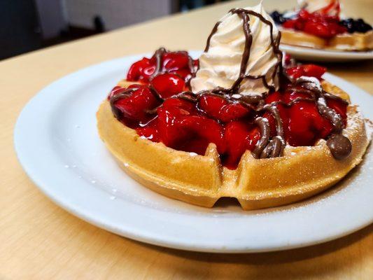 Nutella and Strawberries on a waffle say no more! Delicious