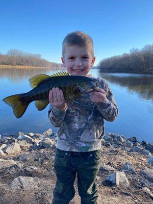 2020 winter fishing.  Young fella with nice bass here.