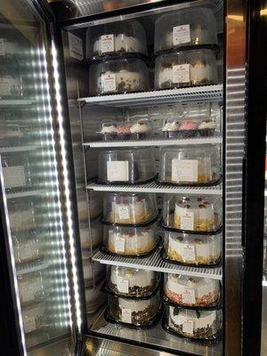 Our signature ice cream cakes along with our weekly manager specials on some petite cakes!