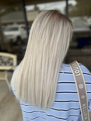 Hand tied and invisible Extensions complete with a Blonding service by Sandi Adams