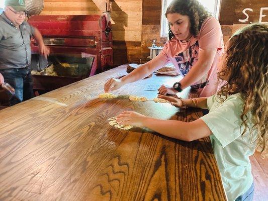 Showing the kids what the wheat is like when milled