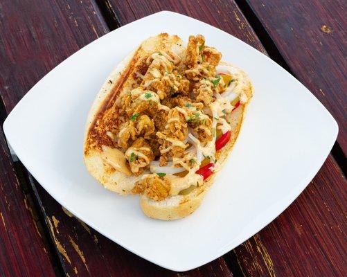 Fried Oyster Po' Boy ~ With Tomatoes, Onions, Pickles and Cajun Mayo Topped with Herbs on a French Roll