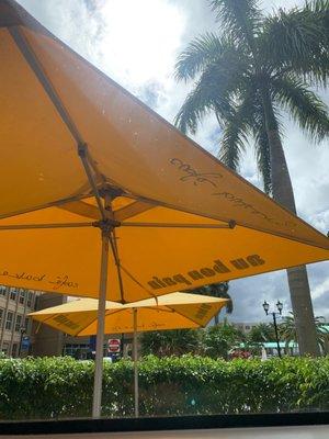 Outside seating umbrellas with logo.