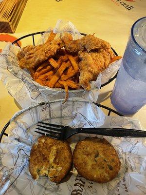 Chicken Strip basket with Sweet Potatoe fries and an order of crab cakes.