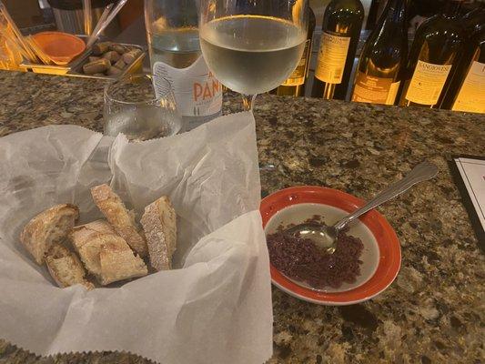 Sauvignon Blanc , aqua panna, bread service w oil and olive tapenade