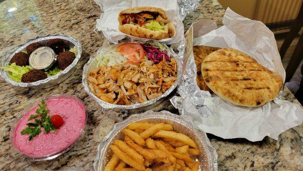 Chicken Gyro: Seasoned chicken served w/ rice, salad & pita bread. Falafel appetizer w/ hummus. Fries. Beet dip. Chicken Gyro wrap.