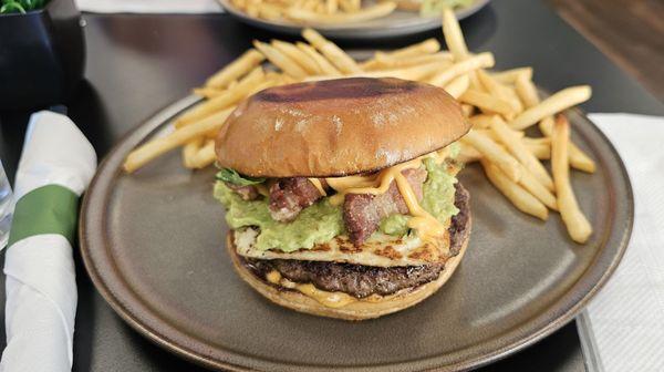 SAZON BURGER Angus beef patty topped with fried cheese, guacamole, pork belly , cilantro and spicy mayo. $18.00