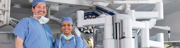 Dr. Gillian & Divya  Bansal PA-C in the operating room with the Da Vinci Robot.  Dr. G was the first Gen Surgeon the Mid Atlantic to use it.