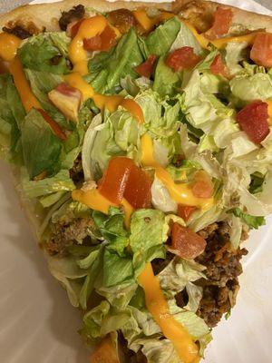 slice of mexican taco pizza.  delicious!