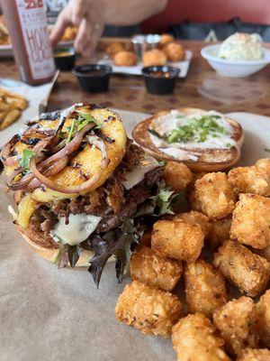 Delicious Luau Burger & lightly seasoned tots.