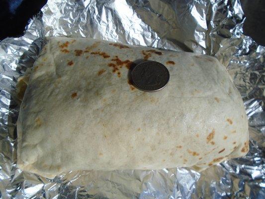 A JUMBO beef burrito (see quarter for scale) - very good - yum!