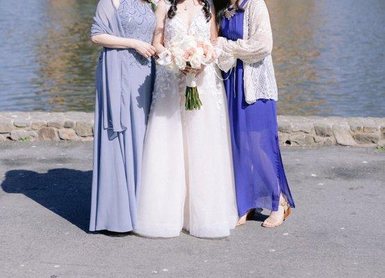 Mother of the bride dress (left) and wedding gown (center) altered by Laura