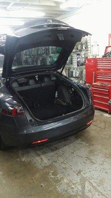 Tesla 2016 adding bass system and amplifier to the factory system