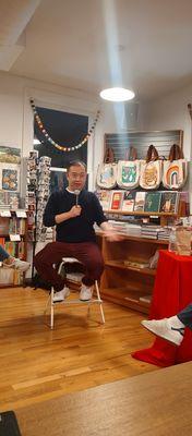 Author Kevin Pang giving a talk