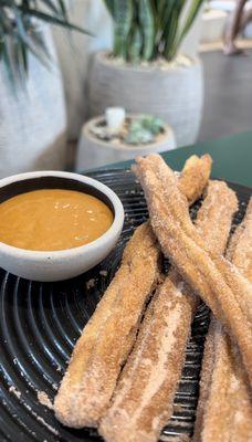 Churros with caramel sauce