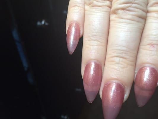 Super thin gel polish at Happy Nails they would put another coat on until they look nice.