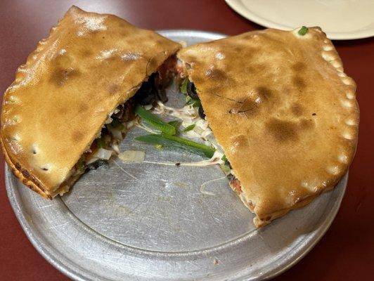 Stromboli with pepperoni, mushrooms, onions, green peppers and black olives. Ingredients were fresh and delicious!