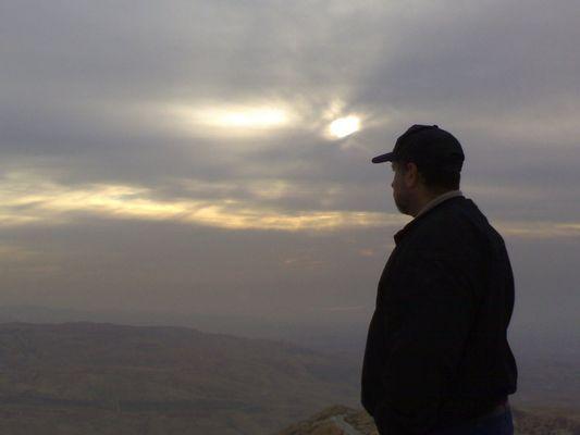 Jeff observing a breathtaking sunset at Mt. Nebo in Jordan